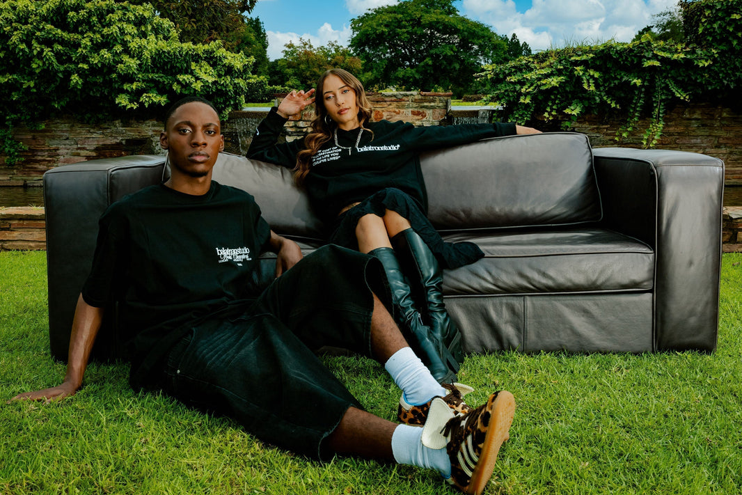 Models styled in minimalist streetwear by local fashion designers in South Africa, blending comfort and contemporary design.