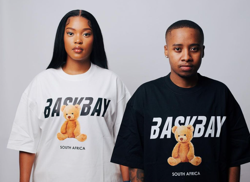 Two models wearing BackBay South Africa graphic T-shirts showcased in a brand store online