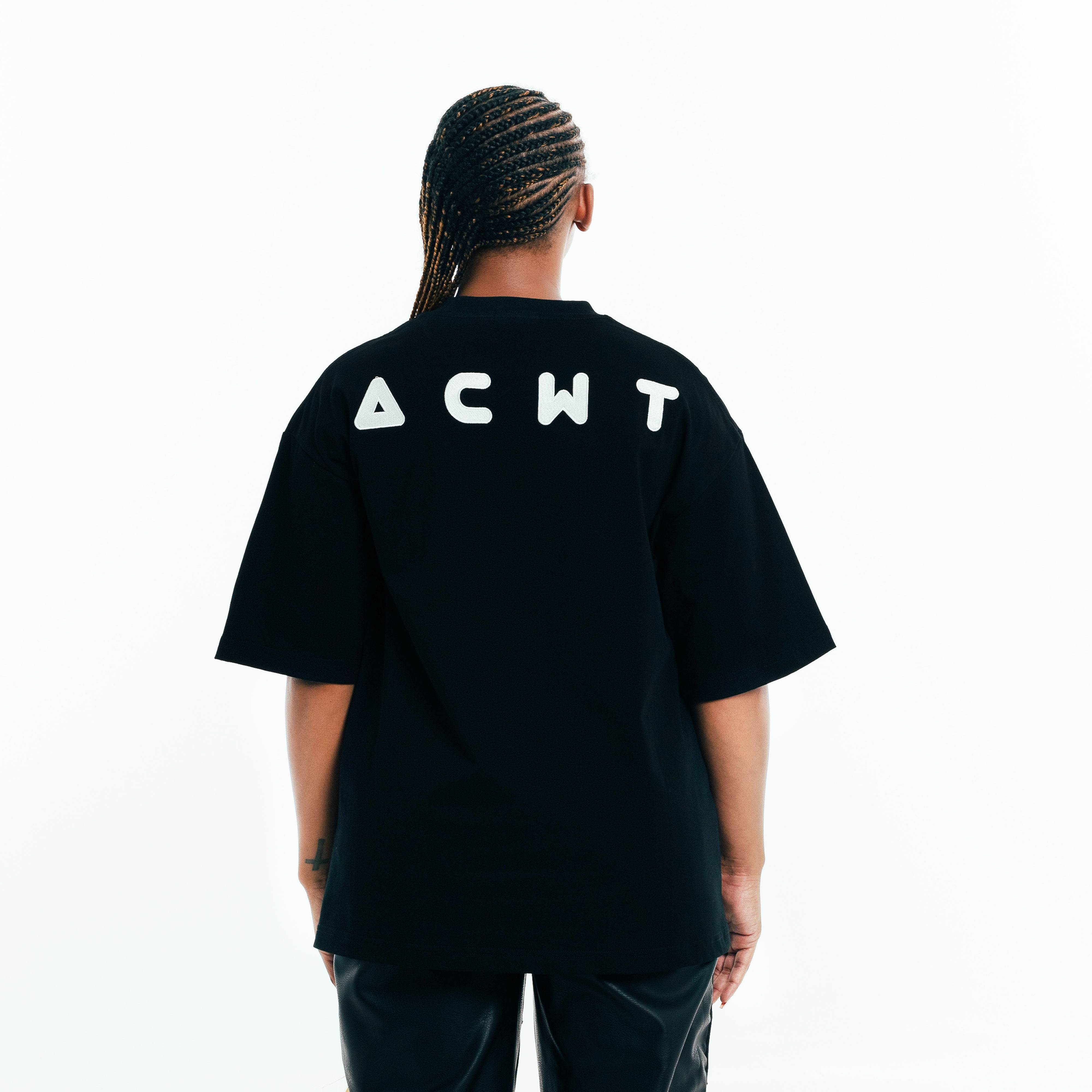 Back view of black branded t-shirt with bold ACWT print
