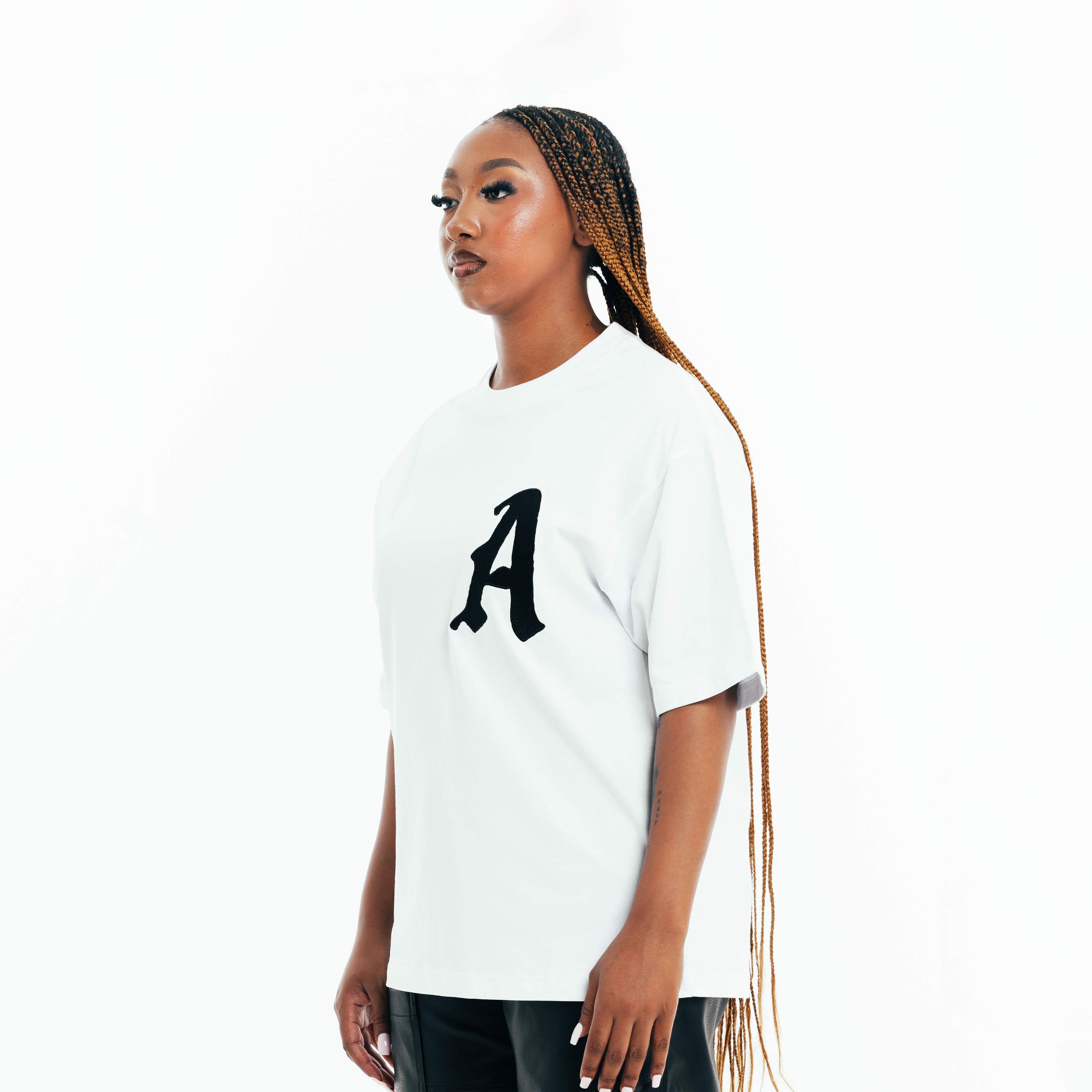 Side view of white cotton t-shirt with logo, casual everyday style